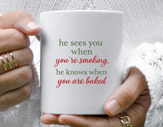 Funny Christmas Mug: He Sees You Smoking Knows When You're Baked Santa Humor M784