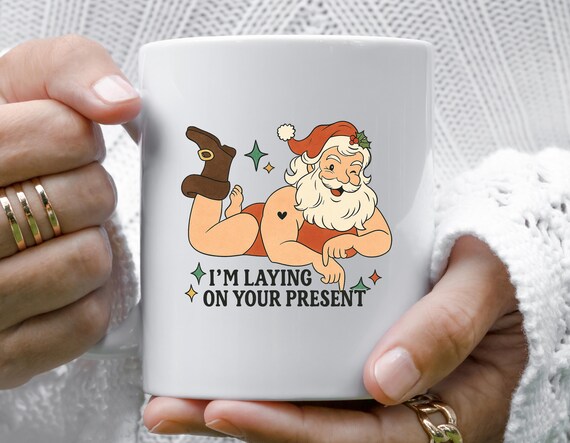 Funny Santa Claus Christmas Mug - Naughty Santa Laying On Your Present Design M923